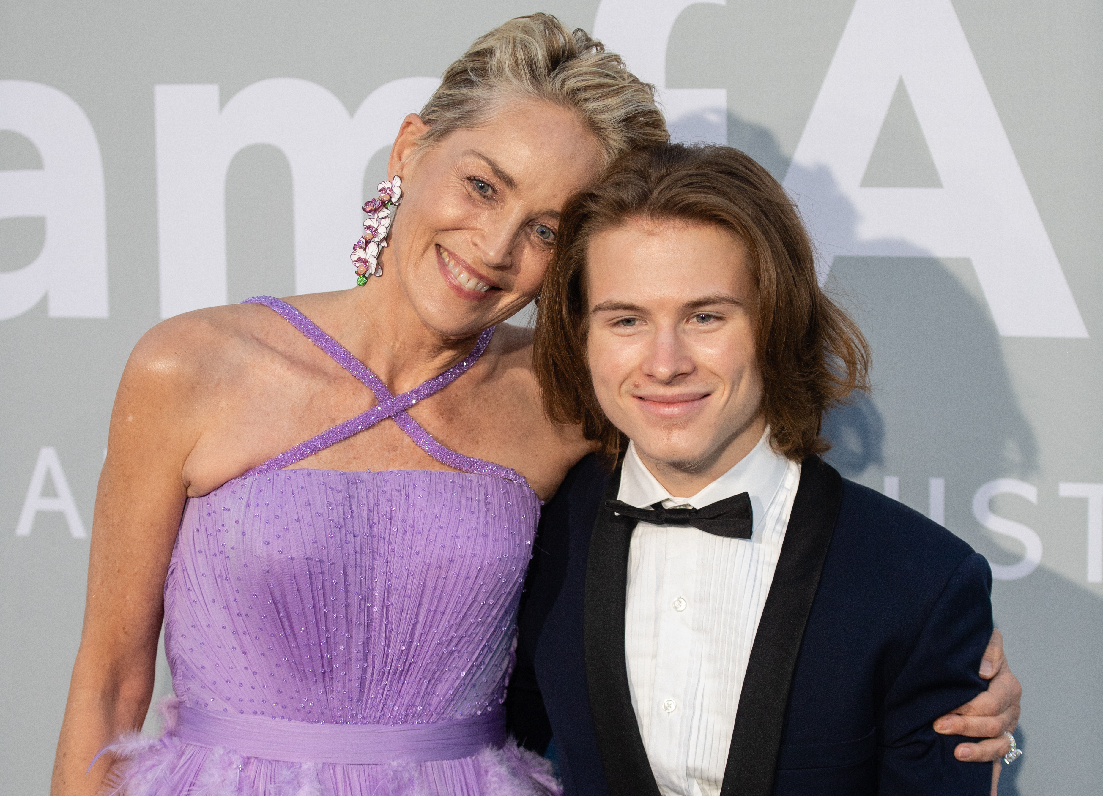 Sharon Stone and Roan Joseph Bronstein Stone at the amfAR Cannes Gala 2021.